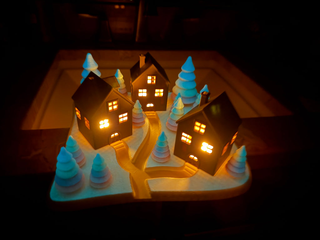 Tealight houses with winter landscapes