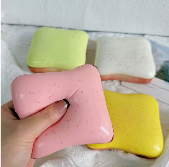 Pastel Toast Squishy — supplier photo showing Pink. Listing includes one toy.